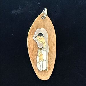 Vintage Dag Spain enamel praying Madonna on wood pendant